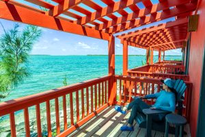 the bright charming lodge welcomes guests with spectacular waterfront views