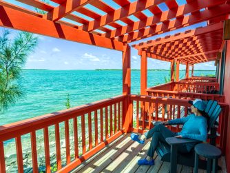 the bright charming lodge welcomes guests with spectacular waterfront views