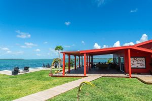 the bright charming lodge welcomes guests with spectacular waterfront views