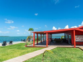 the bright charming lodge welcomes guests with spectacular waterfront views