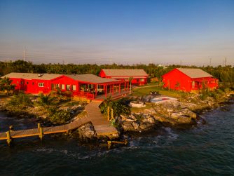 the bright and charming lodge welcomes guests with spectacular sunsets